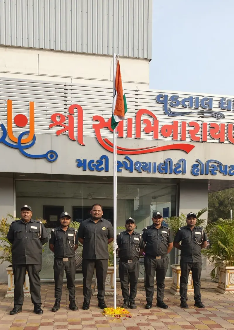Guards standing in front of a hospital entrance